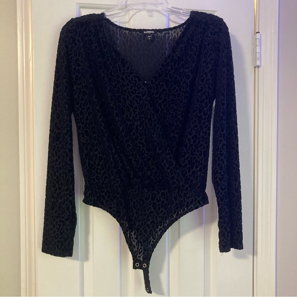 Express black leopard print v-neck body suit. Size medium. Sheer.